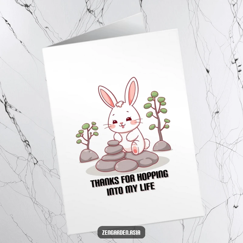 Funny Free Printable Thank You Card: A cheerful rabbit carefully places stones in a zen garden, offering serene thanks.