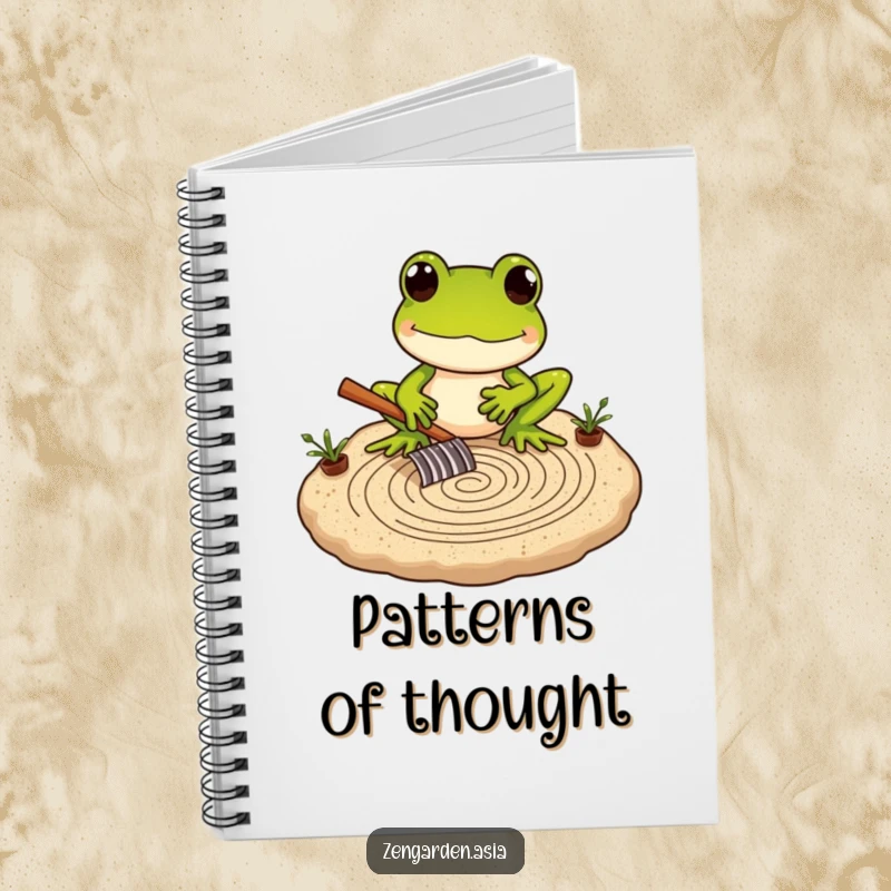 Funny Frog Zen Master Notebook featuring a frog carefully raking a miniature sand garden, ideal for peaceful notes.